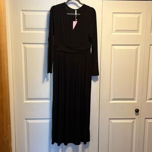 New with tags, black maxi dress, long sleeve crossover front. CATHY size L large